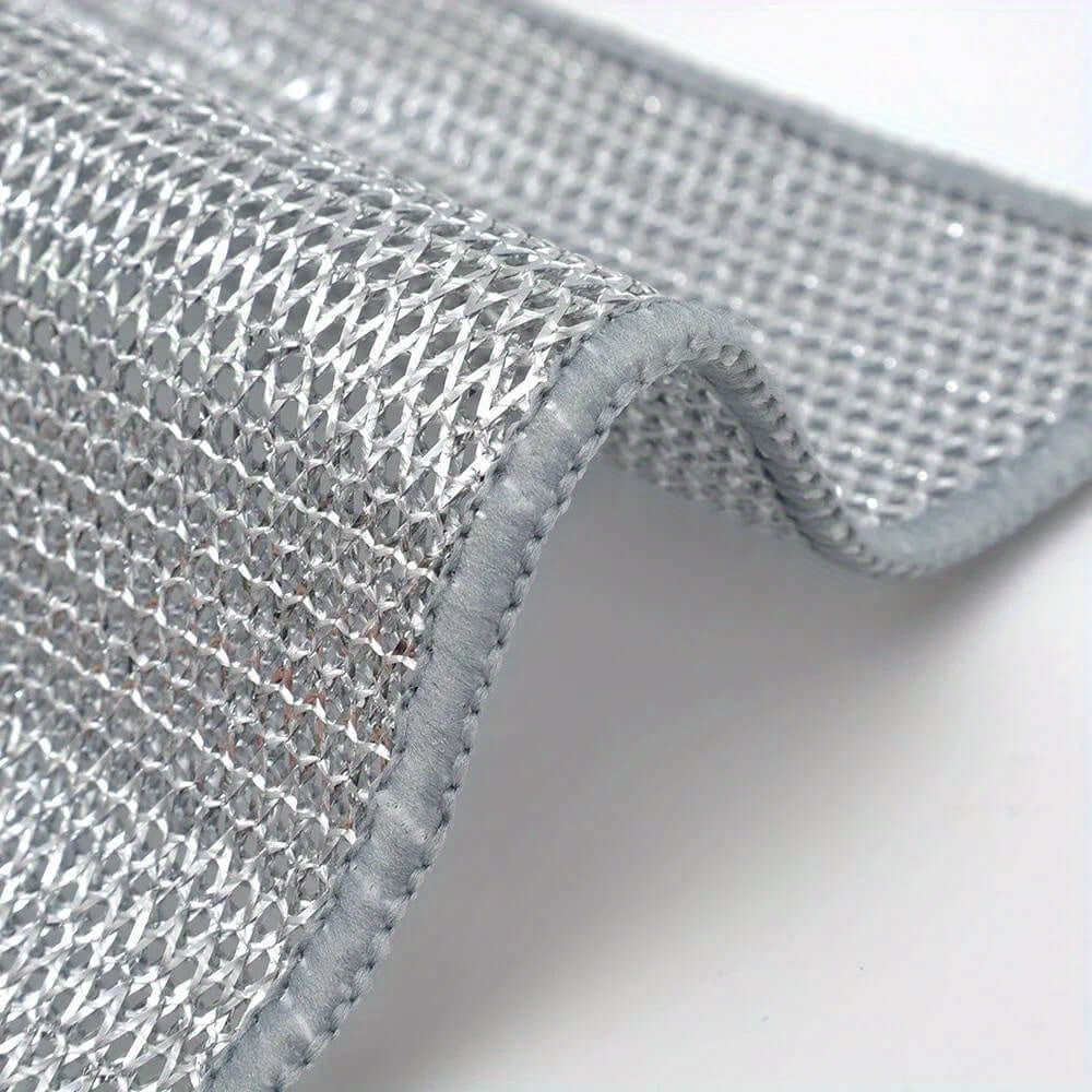 Close-up of 12pcs non-stick oil iron dishwashing cloth, featuring a contemporary knit fabric design in silver.