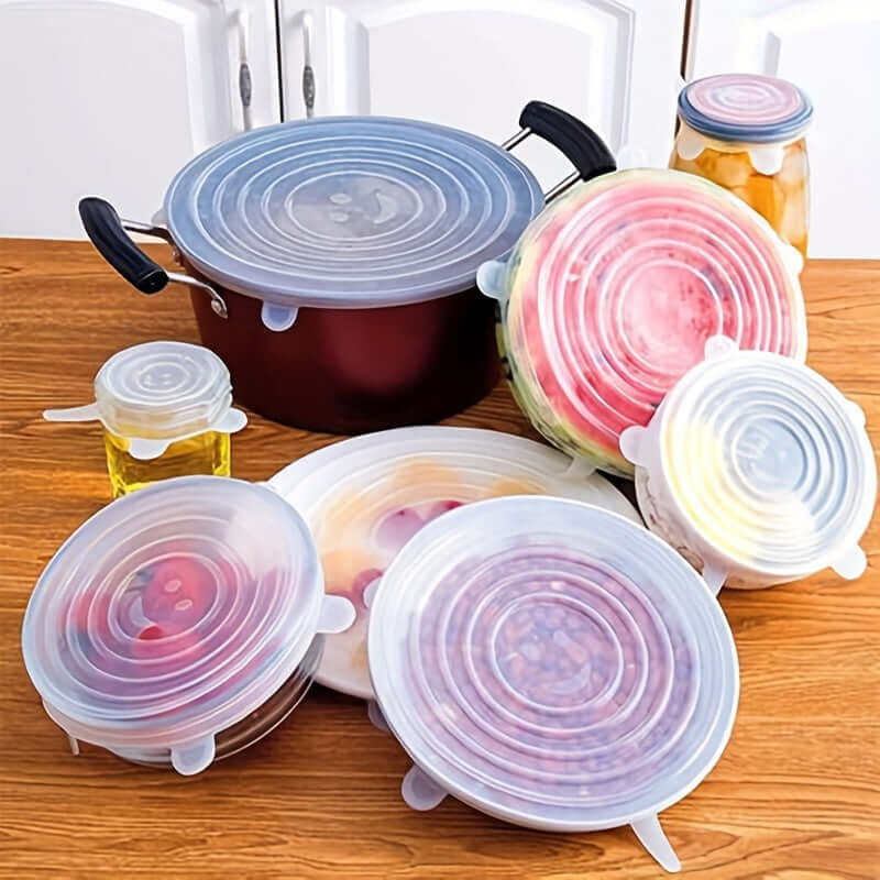 6-pack of reusable silicone food covers in various sizes on a wooden table, ideal for preserving food and reducing waste.
