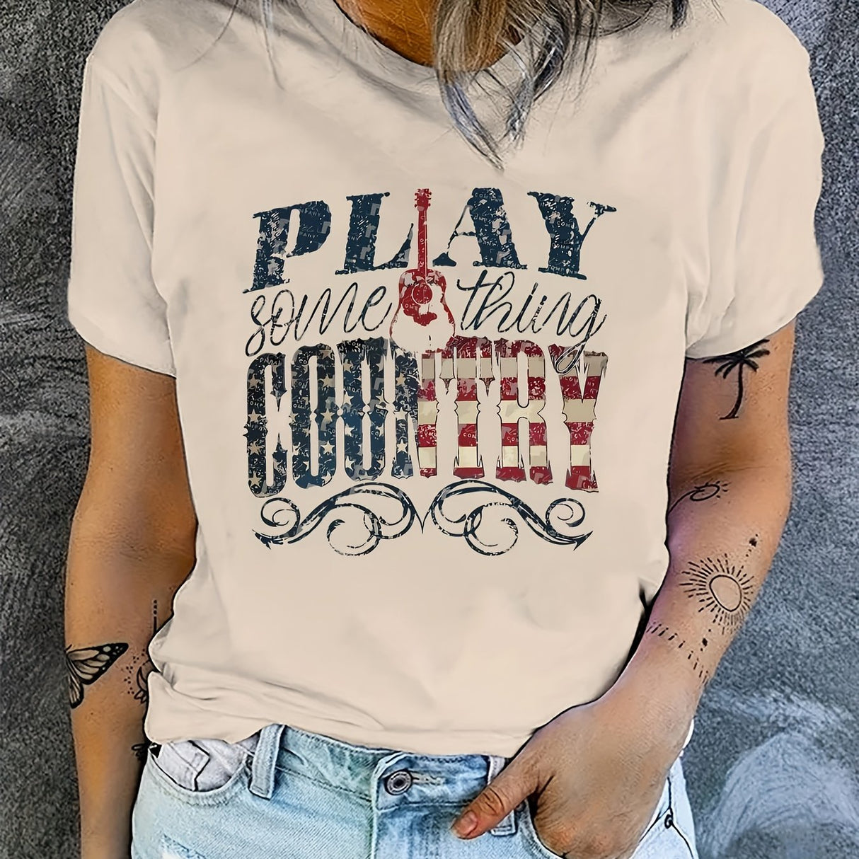 Retro country music festival t-shirt with playful guitar graphic and 'Play Something Country' text.