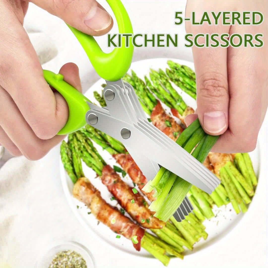 Durable stainless steel kitchen scissors with green handles, cutting layered vegetables and food in a stylish kitchen setting.
