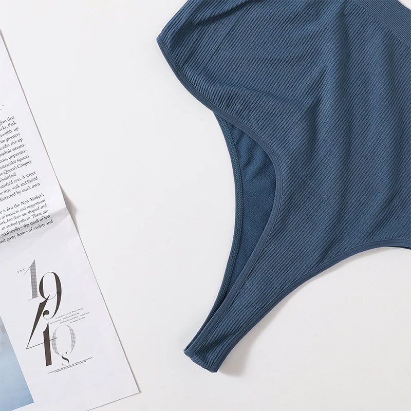 MonoSculpt™ one-shoulder seamless crop top in blue, showcasing a sexy fit and streetwear-inspired design.