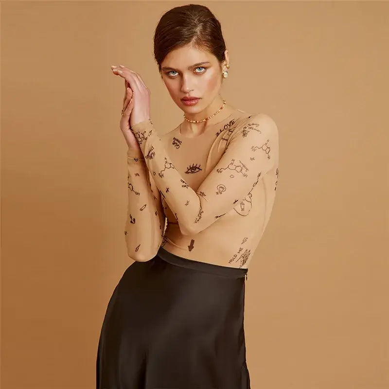 بدلة جسم نسائية مطبوعة بأكمام طويلة ونحيفة