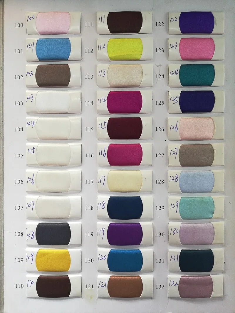 Color swatch samples showcasing a variety of fabric shades and textures for fashion design.