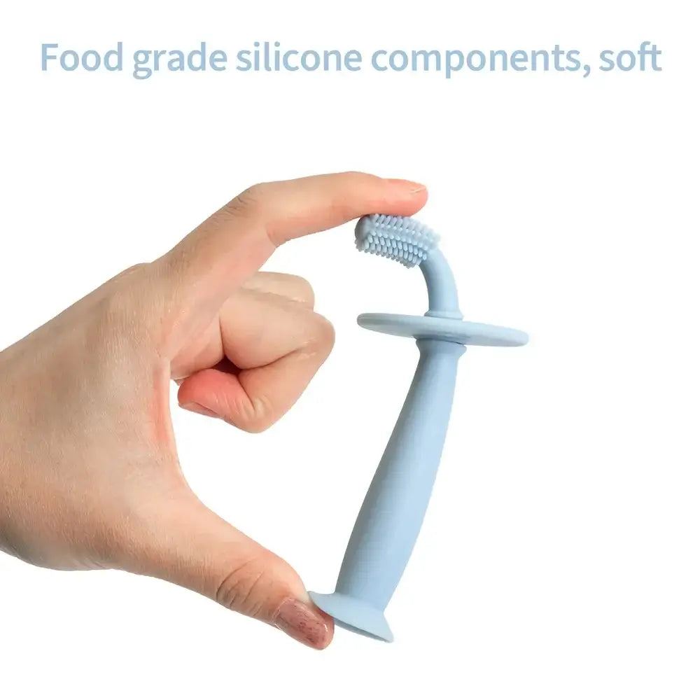 Soft silicone baby training toothbrush designed for infants, safe and easy to hold, made from food-grade materials.