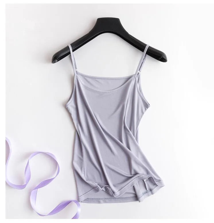 Lightweight lavender silk camisole on hanger, perfect for summer wear. Solid strap design for women.