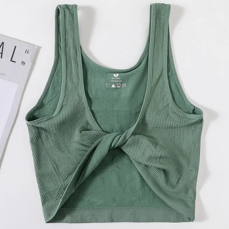 DeepVibe™ women's deep V ribbed crop top in green, seamless streetwear camisole tee, perfect for casual wear.