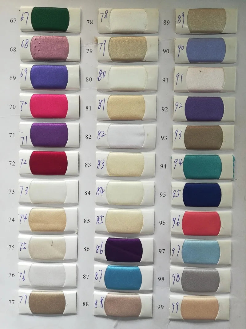 Color swatches displaying a variety of fabric hues, including greens, pinks, purples, and neutrals for design selection.
