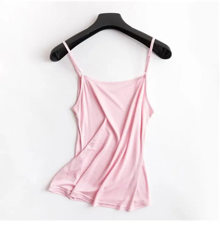 Lightweight pink U-neck silk camisole on a hanger, perfect for summer casual wear.