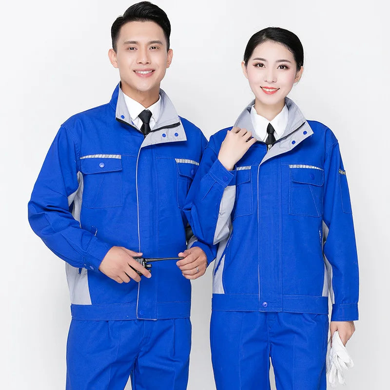 Unisex blue work clothing set worn by a man and woman, featuring durable design and multiple pockets for utility and safety.