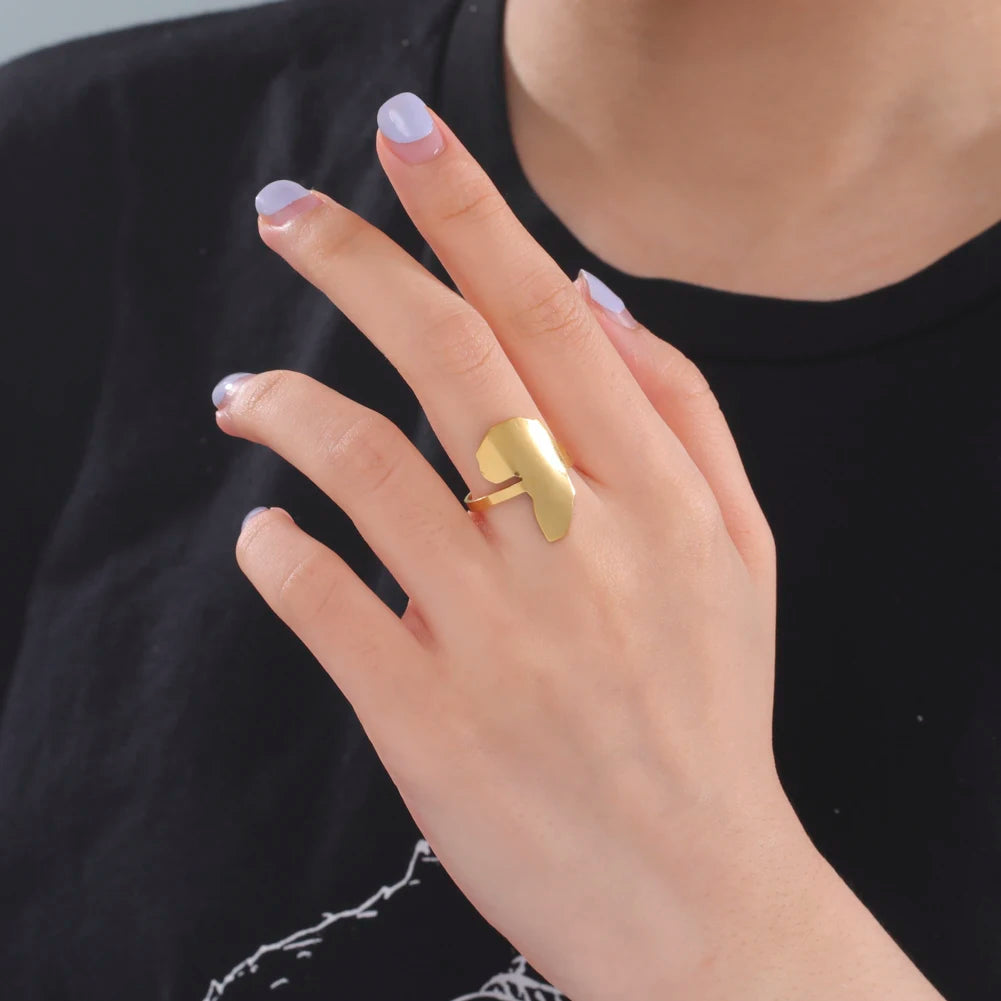 Stylish African map gold ring worn on a woman's hand, showcasing daily wear fashion jewelry.