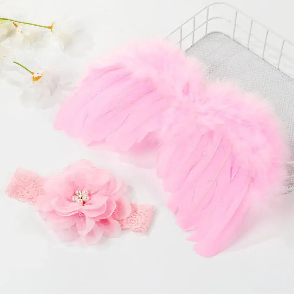 Cute newborn angel feather wings with pink flower headband for baby girls, perfect for photo props and special occasions.