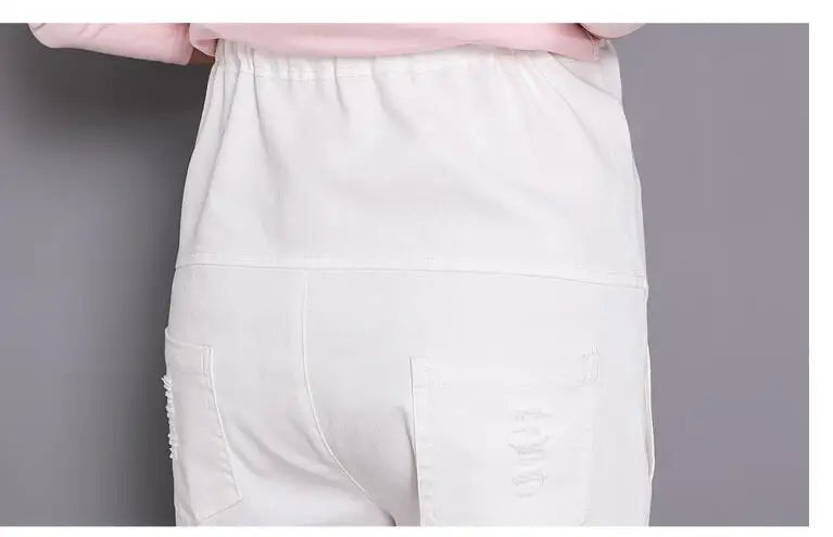 Rear view of casual 3-color maternity pants with pockets, designed for all seasons and a comfortable fit.
