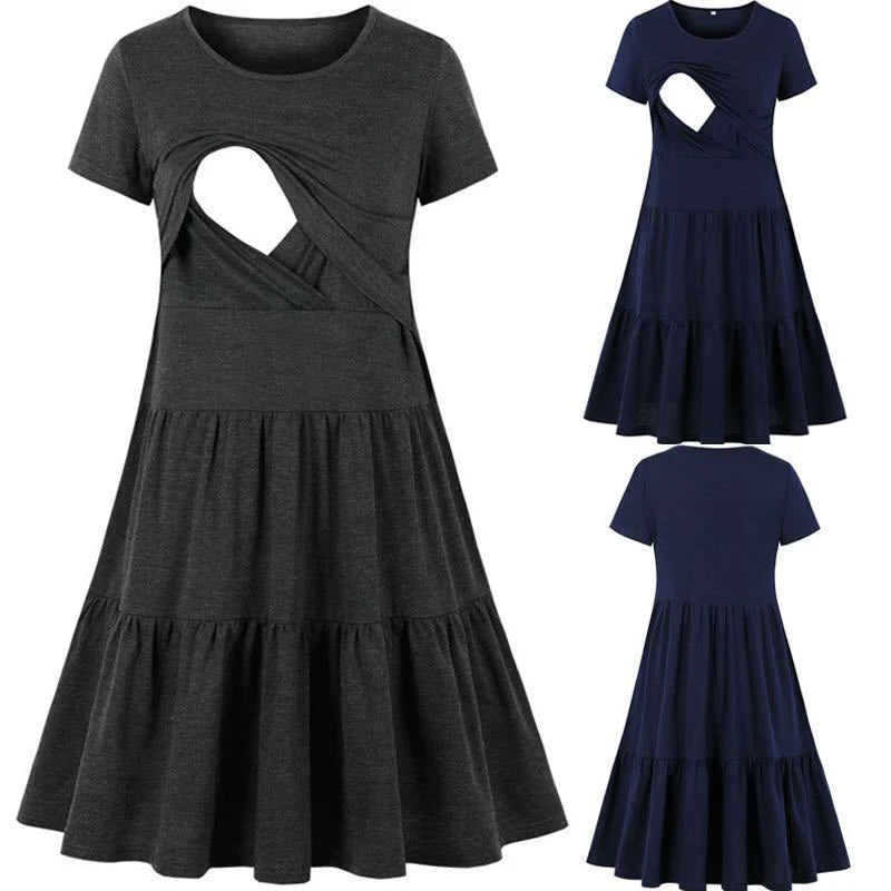Sleeveless pleated nursing dress in grey and navy, featuring a stylish cutout and knee-length design, perfect for maternity wear.