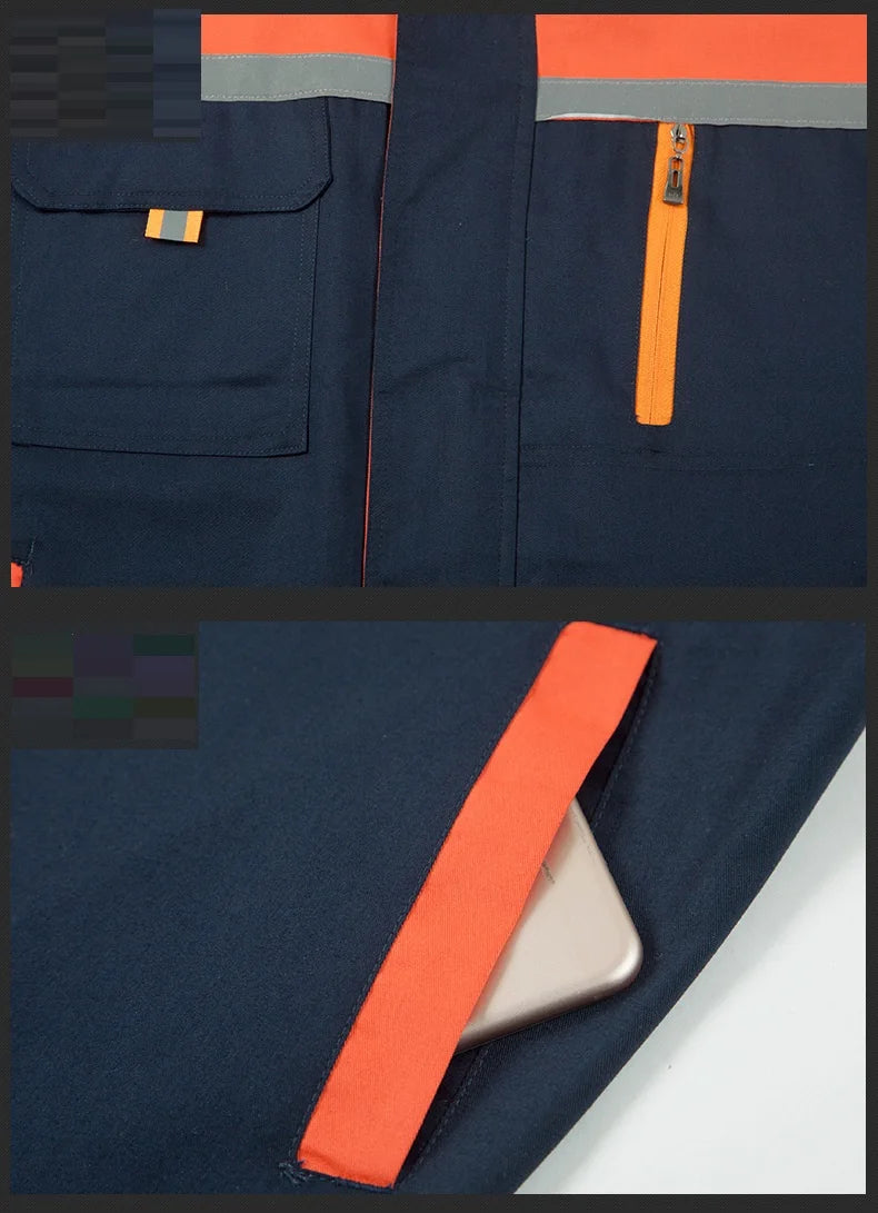Close-up of navy blue short-sleeve coveralls featuring pockets and orange accents, ideal for workshop and mechanic use.