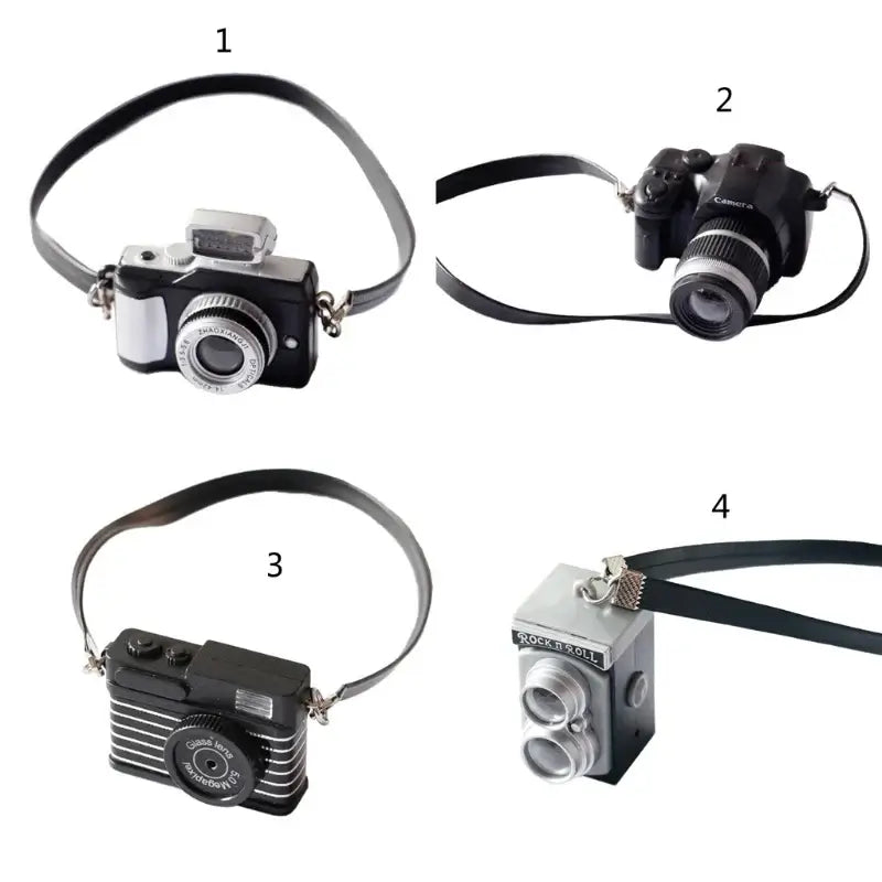 Mini camera collection for dollhouse, featuring various styles in black, perfect for baby photography props.