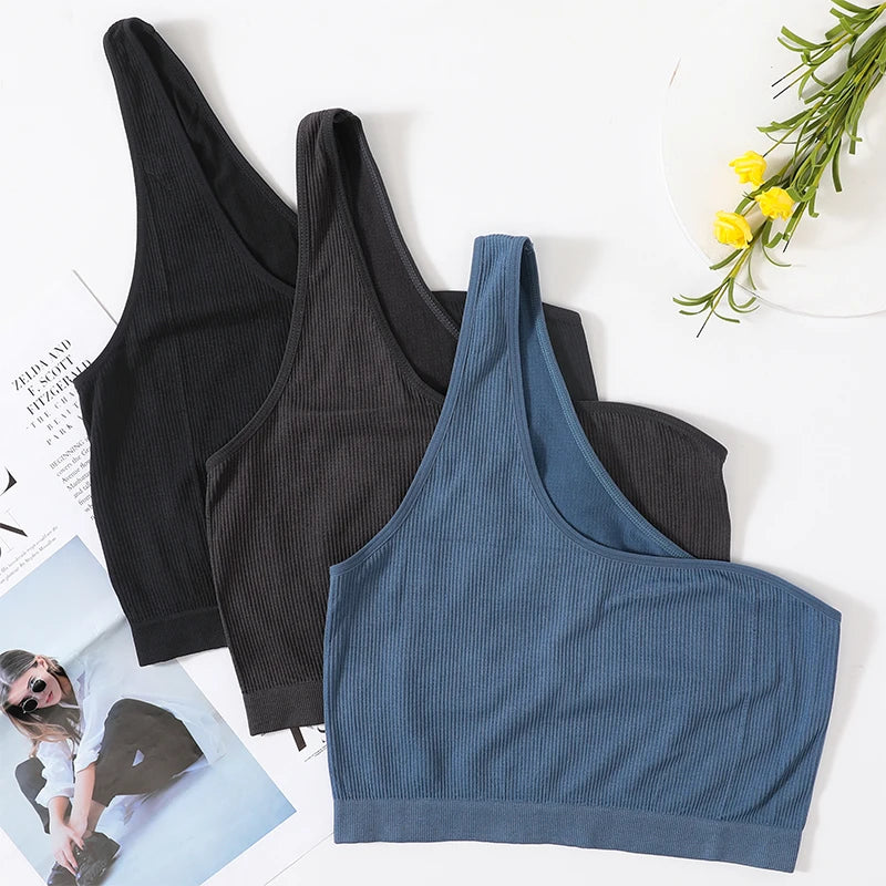 MonoSculpt™ one-shoulder seamless crop tops in black and blue, stylish streetwear-inspired design for women.