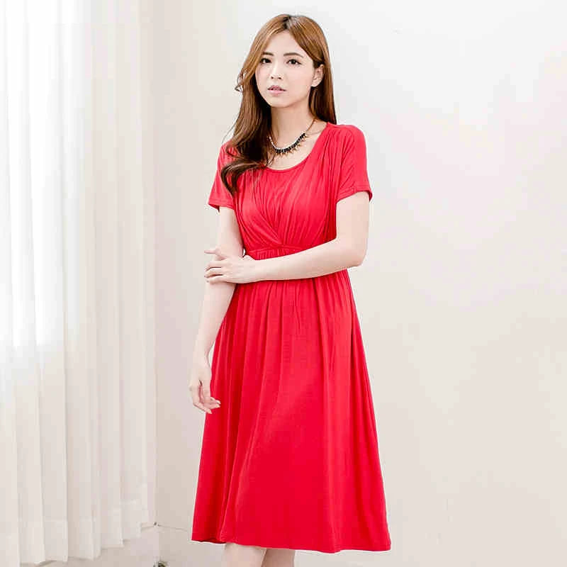 Soft fabric maternity dress in vibrant red, perfect for postpartum and breastfeeding, featuring a flattering V-neck and mid-calf length.