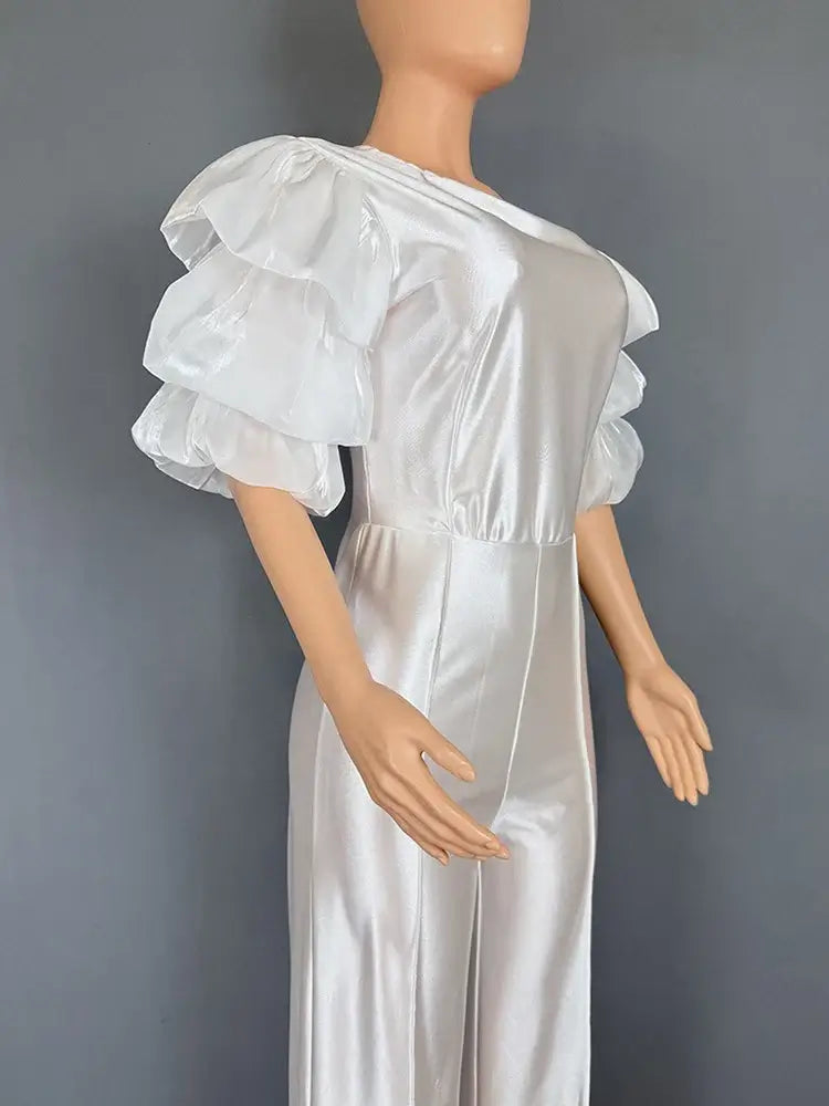 جمبسوت نسائي للحفلات بأكمام منتفخة من الساتان