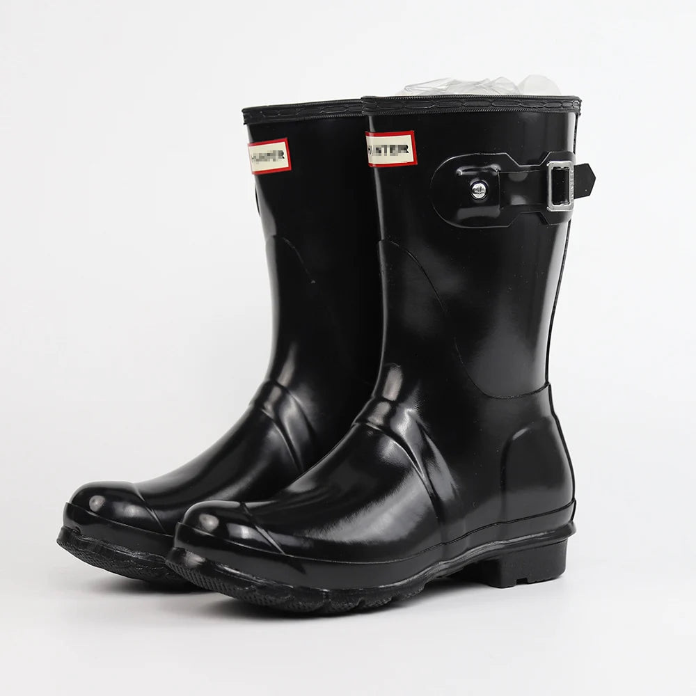 حذاء نسائي من الجلد المطرز حتى منتصف الساق