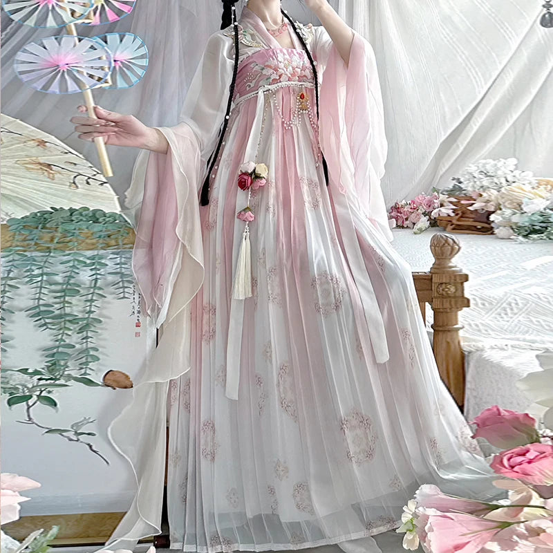 Elegant vintage Chinese Hanfu dress in soft pink with floral details, perfect for women who appreciate traditional style.