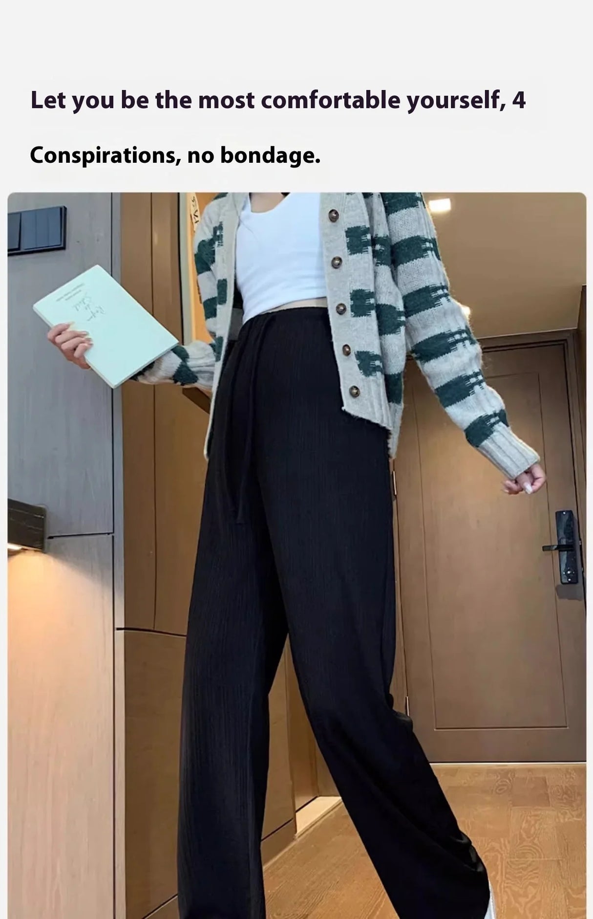 Wide-leg maternity pants styled with a striped cardigan, showcasing comfort and versatility for pregnant women.