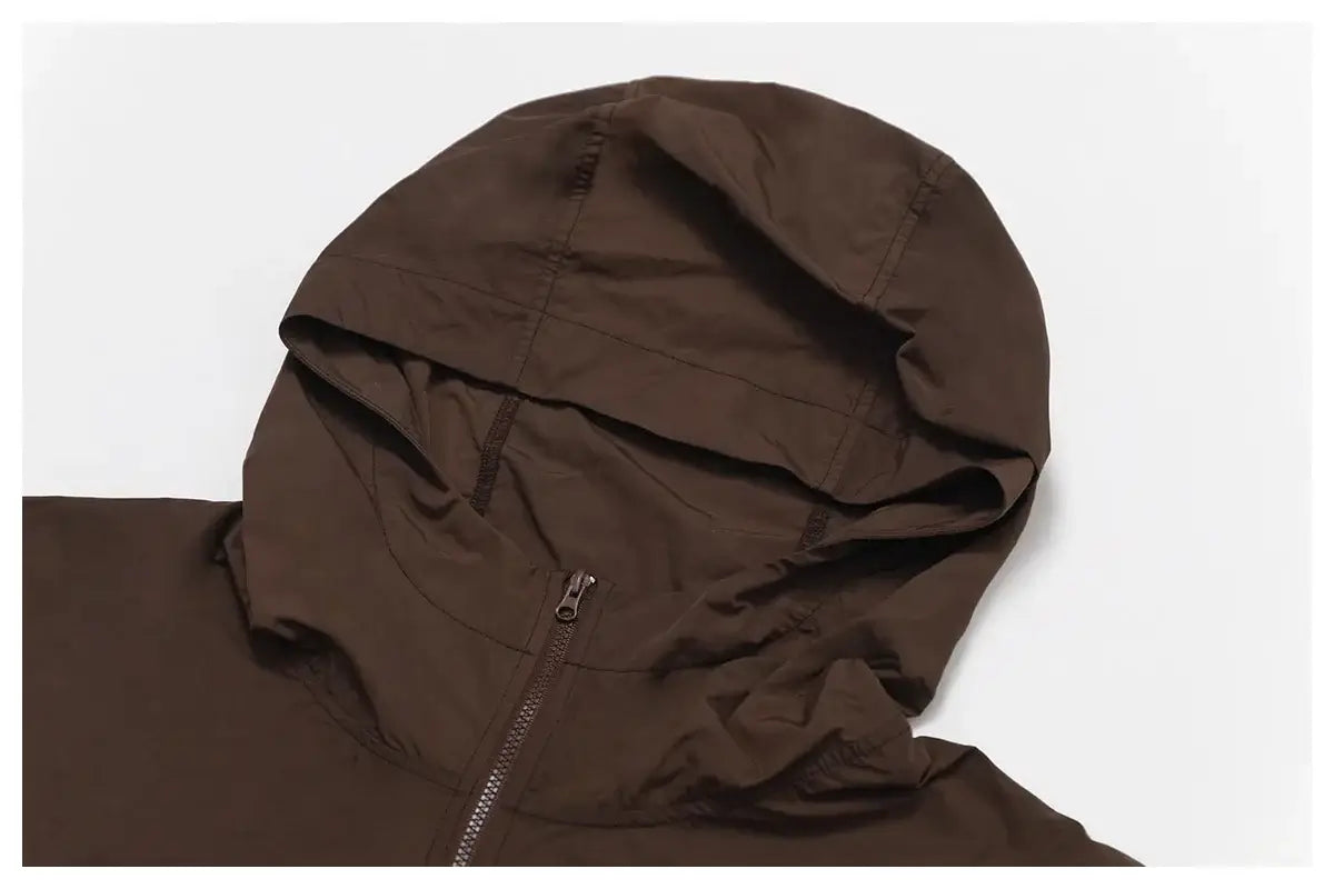 سترة رياضية نسائية سريعة الجفاف بغطاء للرأس