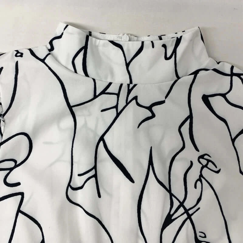 جمبسوت نسائي واسع الساق بطبعة فنية