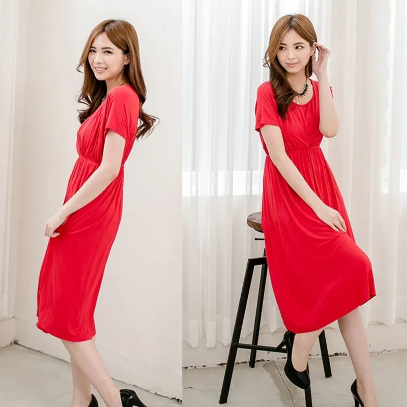 Model showcasing a red soft fabric nursing maternity dress, ideal for postpartum and breastfeeding.