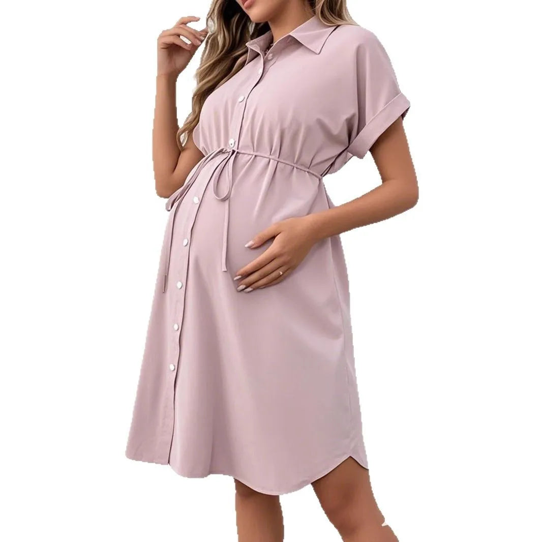 Casual summer striped button shirt maternity dress in light pink, designed for comfort during pregnancy.