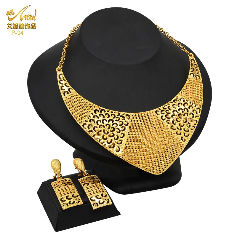 Luxury Indian bridal jewelry necklace and earrings set in 24K gold plating, perfect for weddings.