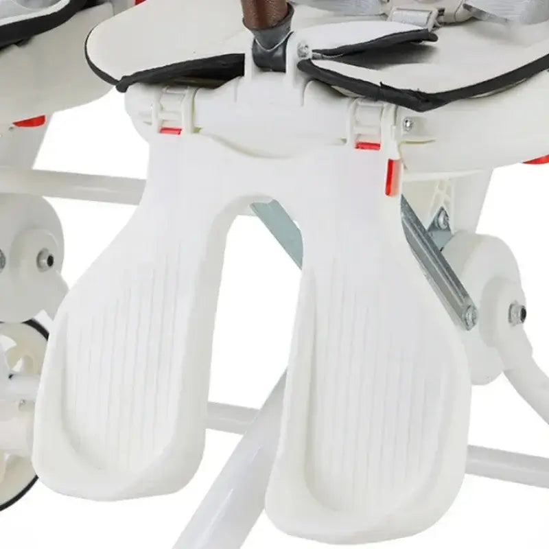 Close-up of footrests on a twin stroller designed for children aged 6 months to 3 years.