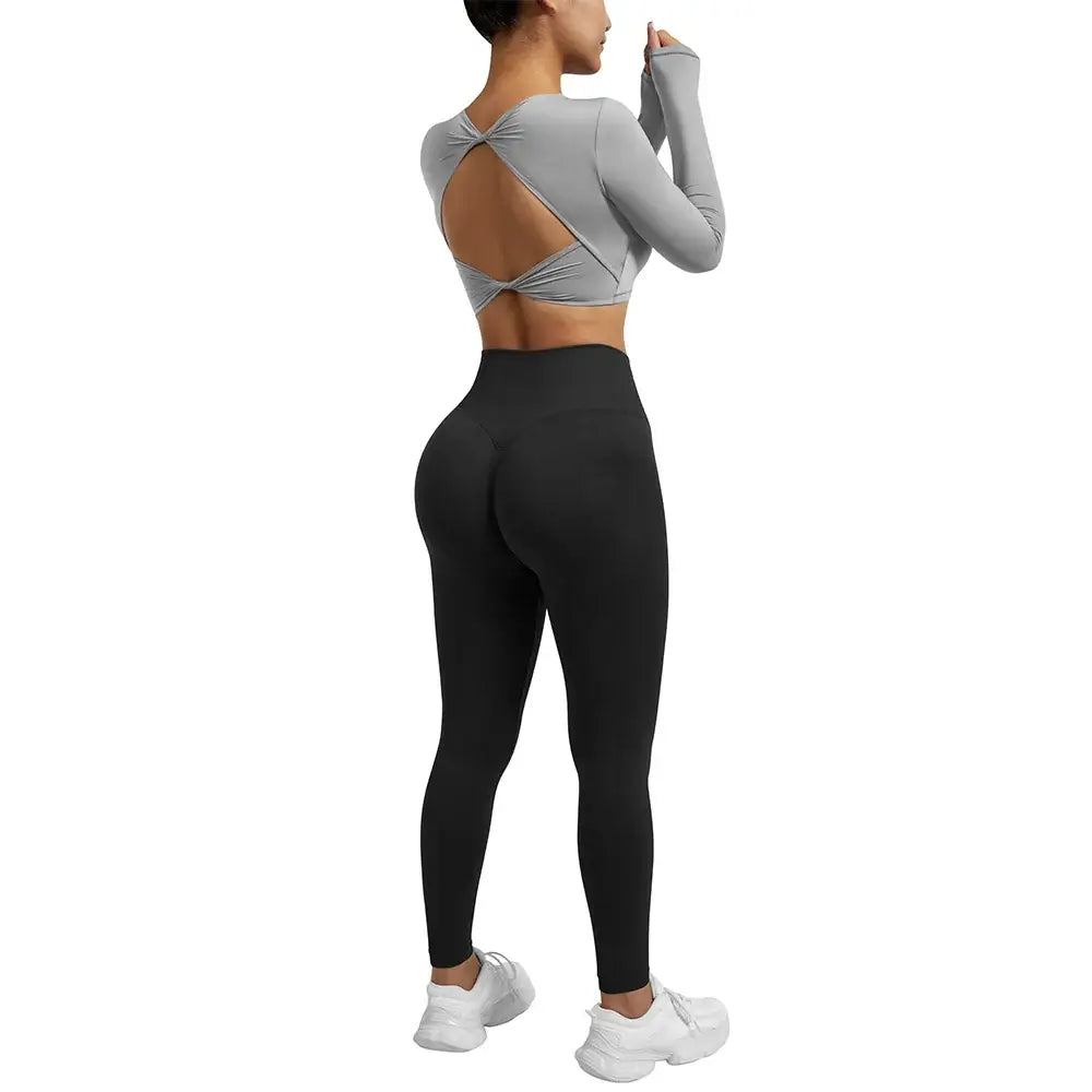 بلوزة يوغا نسائية مفتوحة الظهر بأكمام طويلة