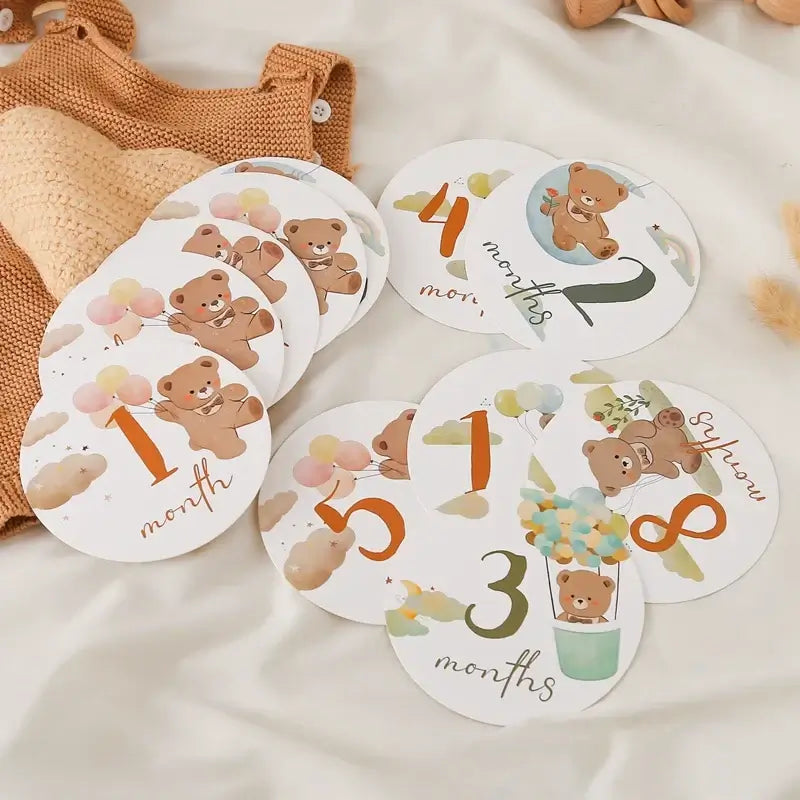 16Pcs Paper Baby Milestone Numbers in bear pattern for monthly age tracking, ideal for unisex newborns.