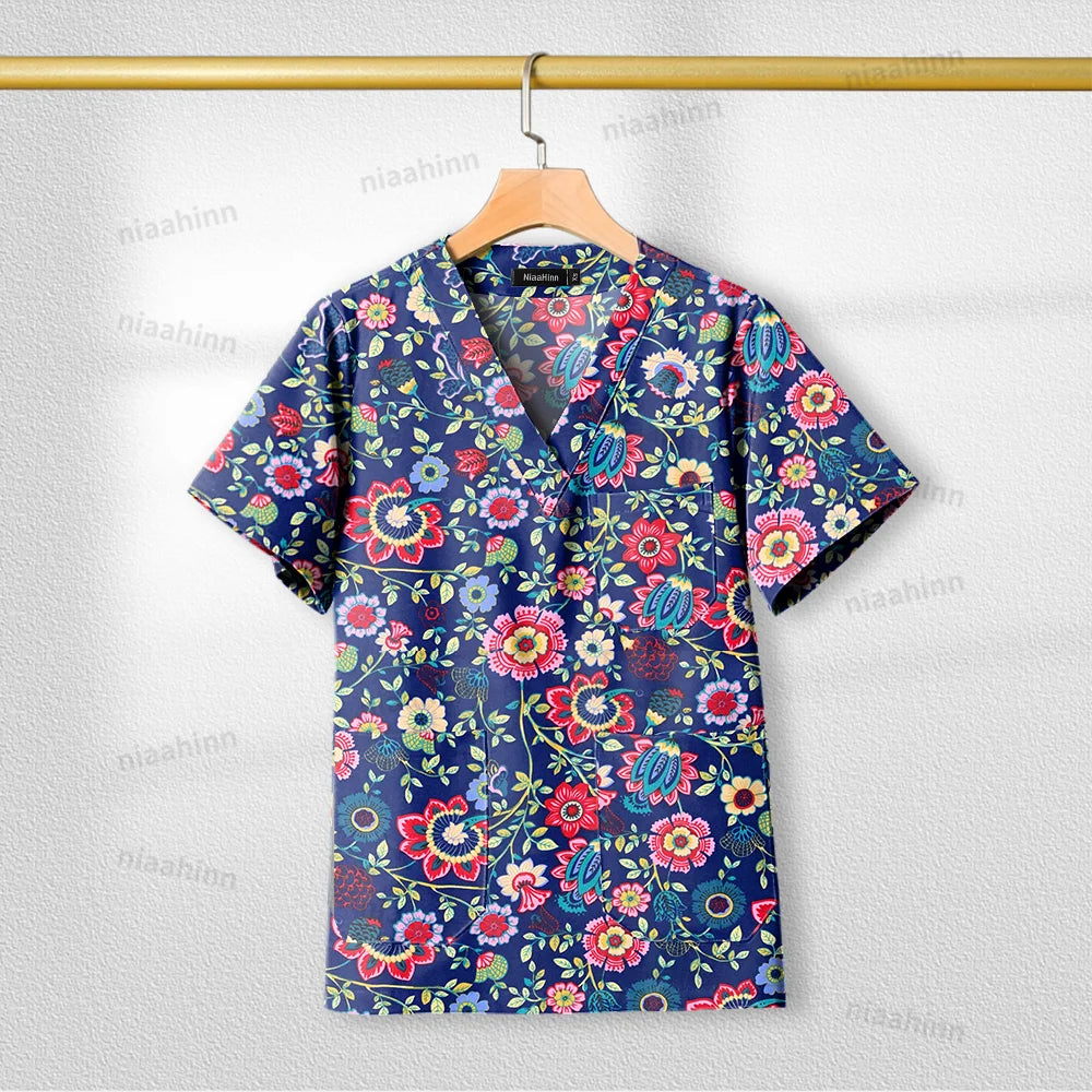 Printed nursing scrub top with short sleeves featuring a floral design, comfortable cotton fabric, and V-neckline.
