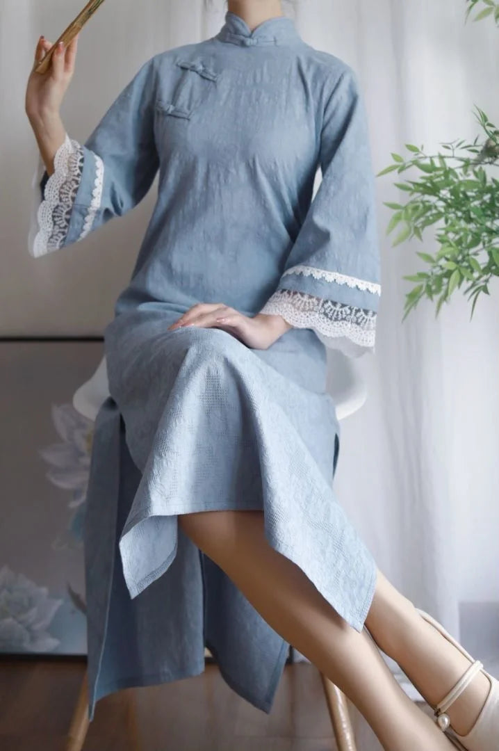 Elegant blue cotton jacquard cheongsam dress with lace details, perfect for boys' traditional attire.