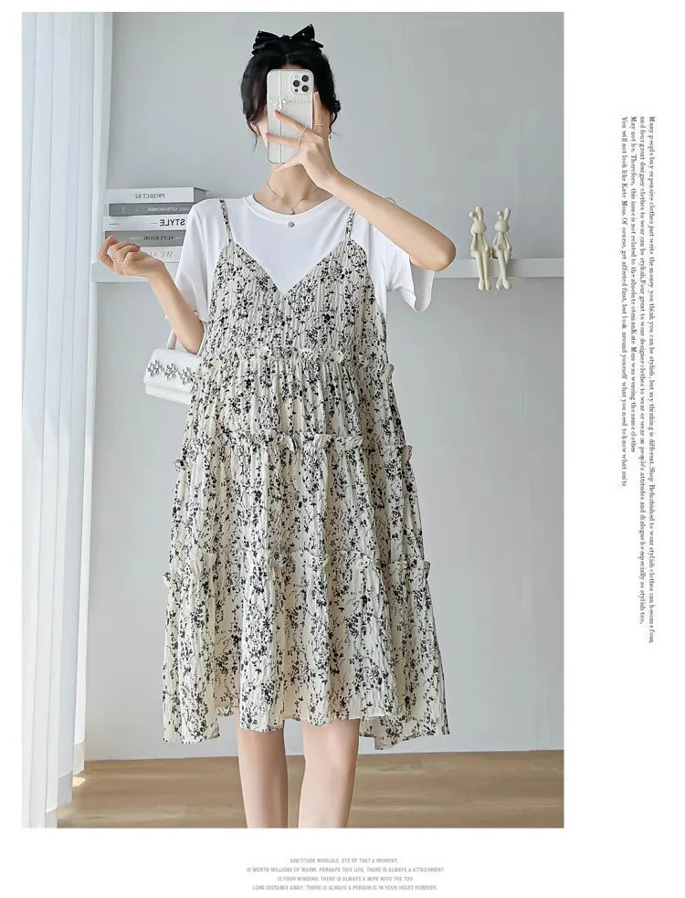 Elegant floral maternity dress with a layered design, perfect for summer baby showers and casual outings.