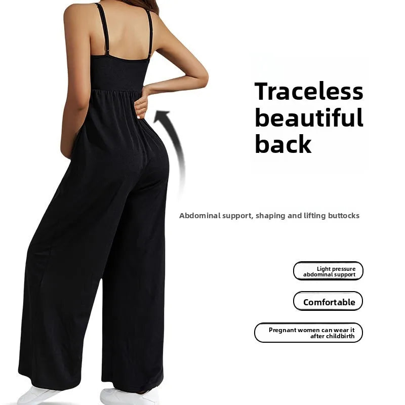 Sleeveless high waist maternity jumpsuit in black showcasing traceless back design with abdominal support.