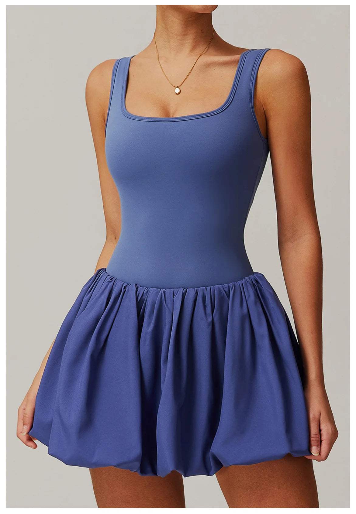 جمبسوت يوغا نسائي مع تنورة تنس