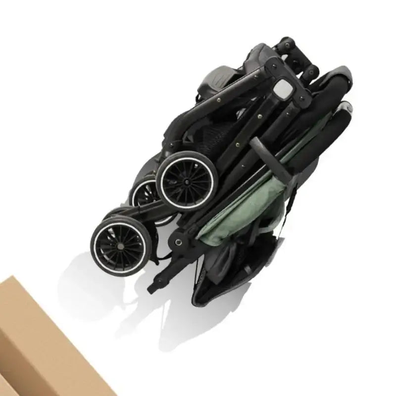 Foldable baby stroller in green and grey, compact design for easy travel and storage.