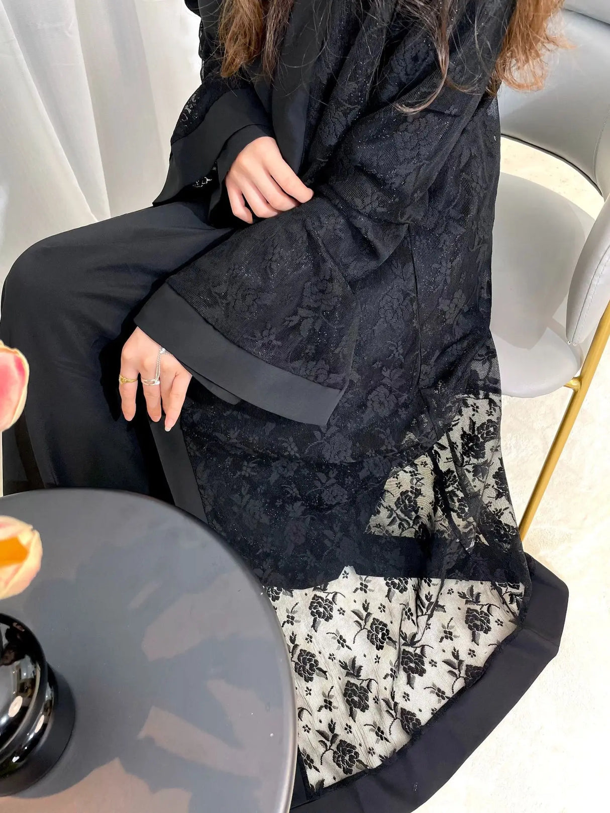 Elegant black Dubai Moroccan kaftan with intricate lace detail, perfect for casual Islamic dress in all seasons.