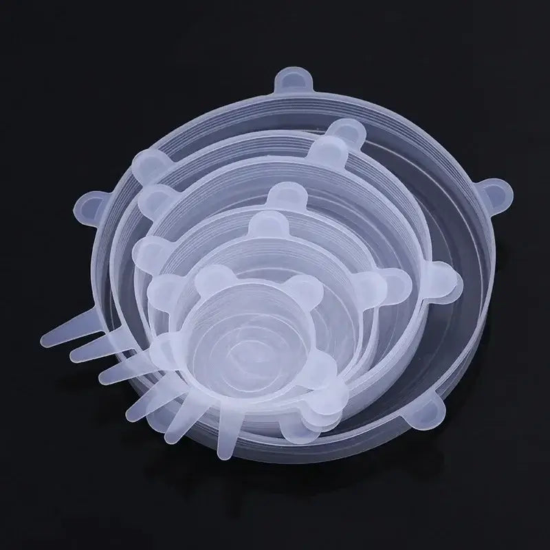Adjustable silicone food covers in various sizes for airtight sealing, reusable and perfect for bowls and dishes.