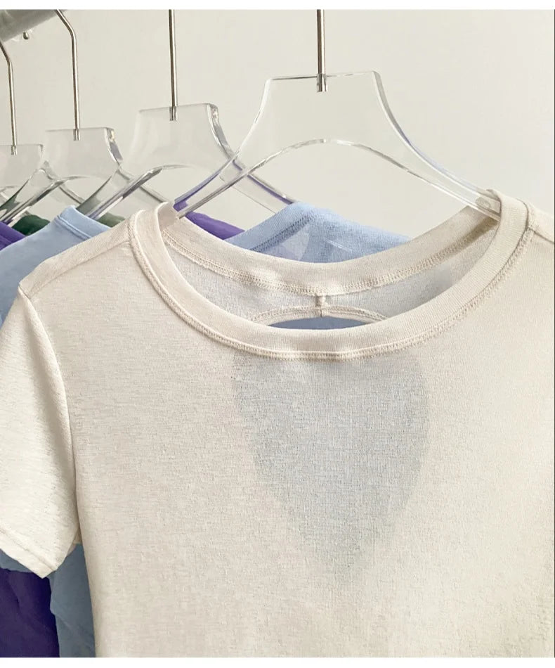 قميص يوغا قصير مفتوح الظهر للنساء