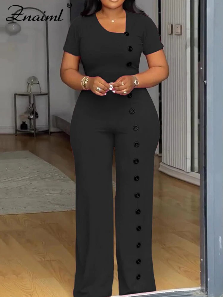 ElanWide™ – جمبسوت بأكمام قصيرة وساق واسعة (أنيق، منسدل، ولامع)