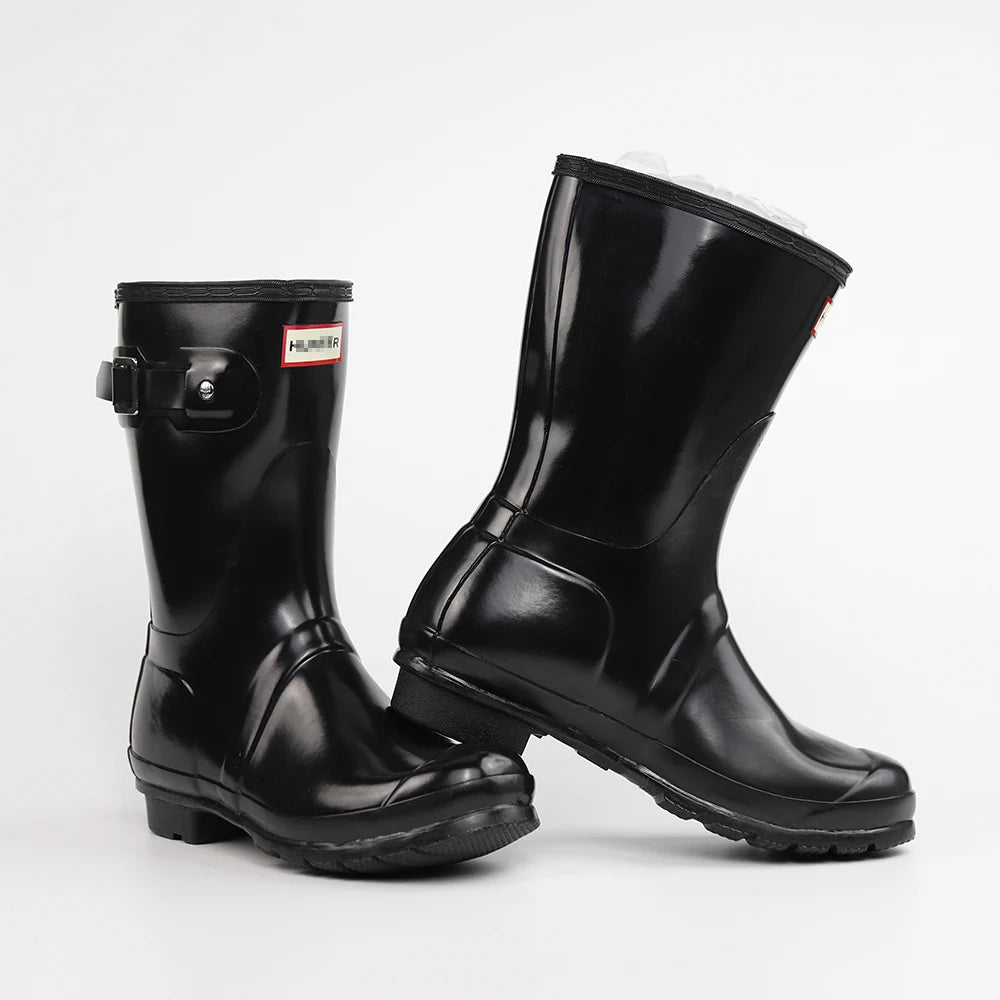 حذاء نسائي من الجلد المطرز حتى منتصف الساق