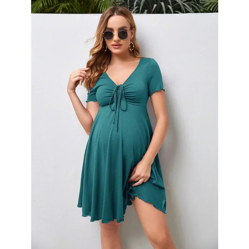 Pure Color V-Neck Maternity Dress in teal, knee-length, stylish summer wear for plus size women.