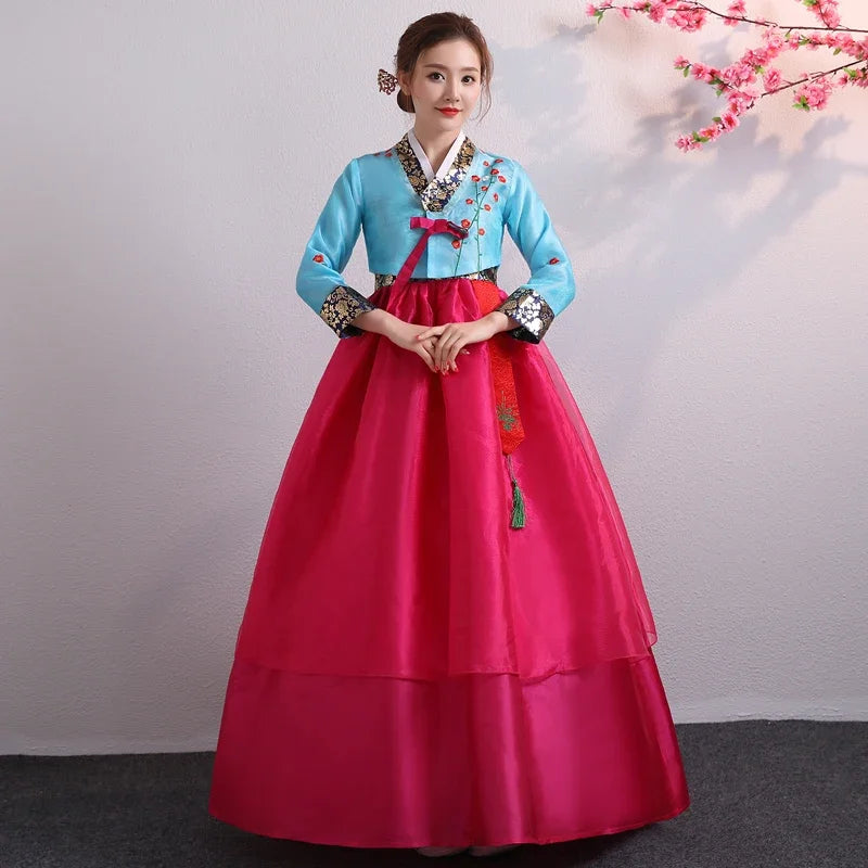 Korean Palace Hanbok dance dress in vibrant blue and pink, showcasing traditional women's clothing design.