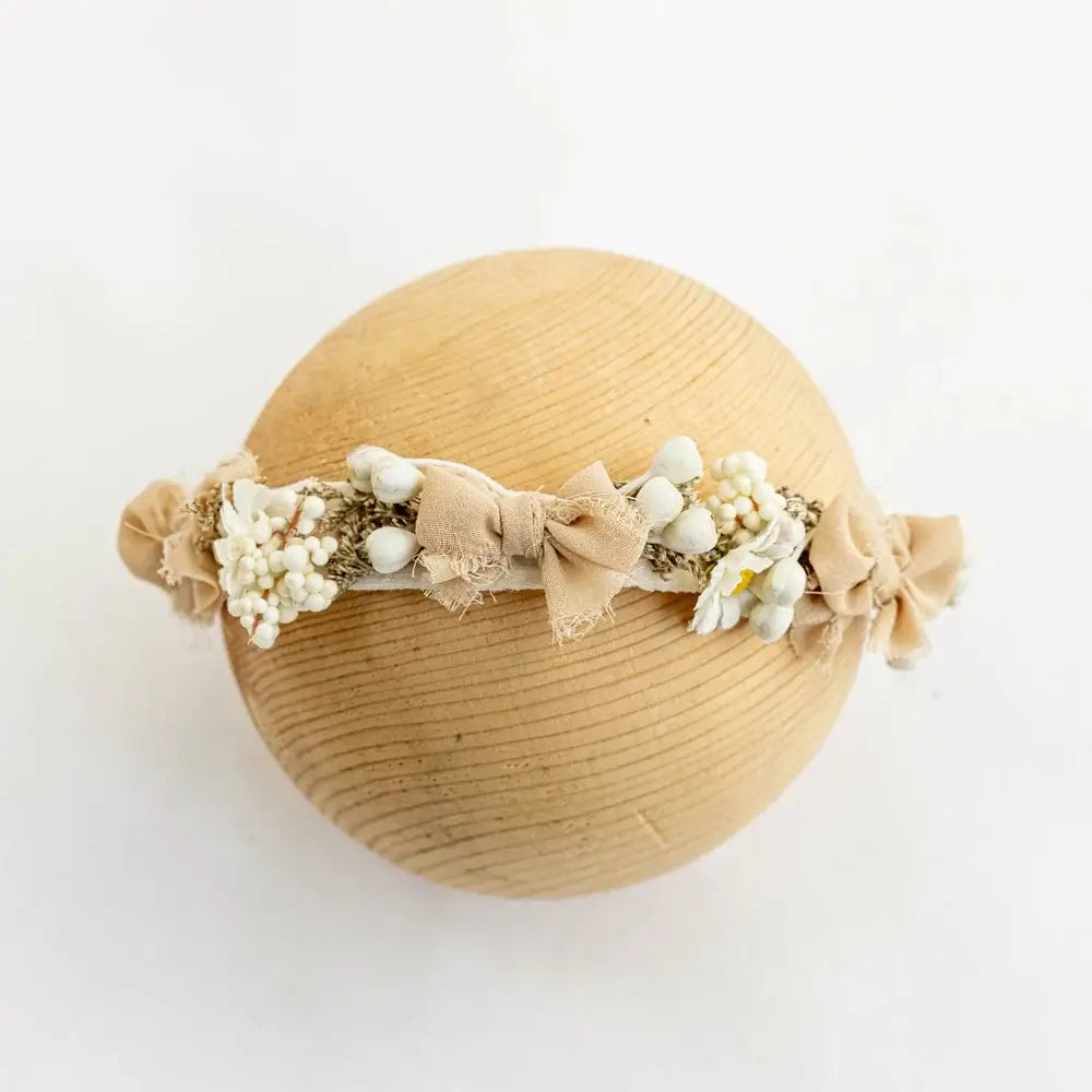 Adjustable faux flower headband for newborn girls, perfect for baby head flower photography sessions.