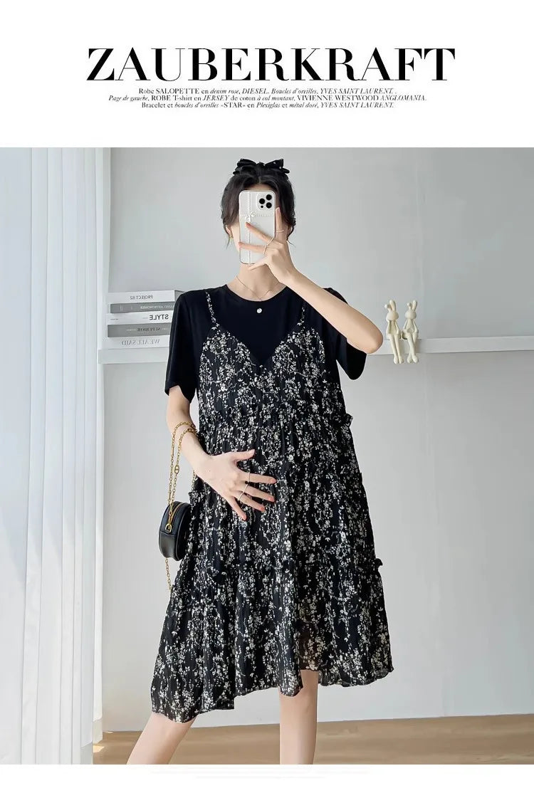 Elegant black floral maternity dress featuring frills, perfect for summer baby showers.