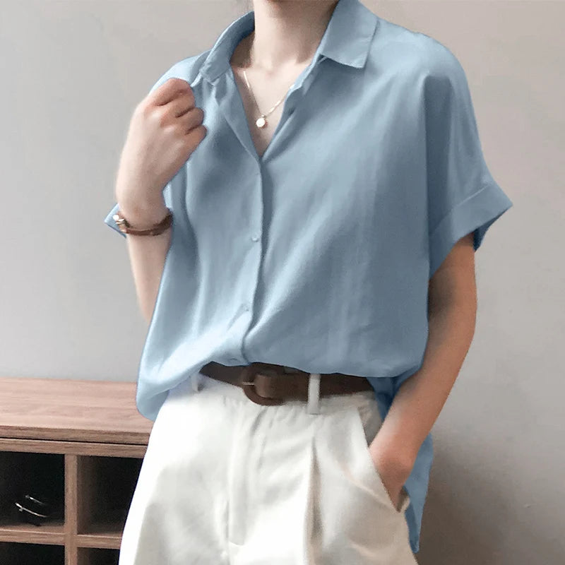 ZanzeaEase™ oversized summer blouse in light blue, featuring a button-down design and relaxed fit, perfect for women.