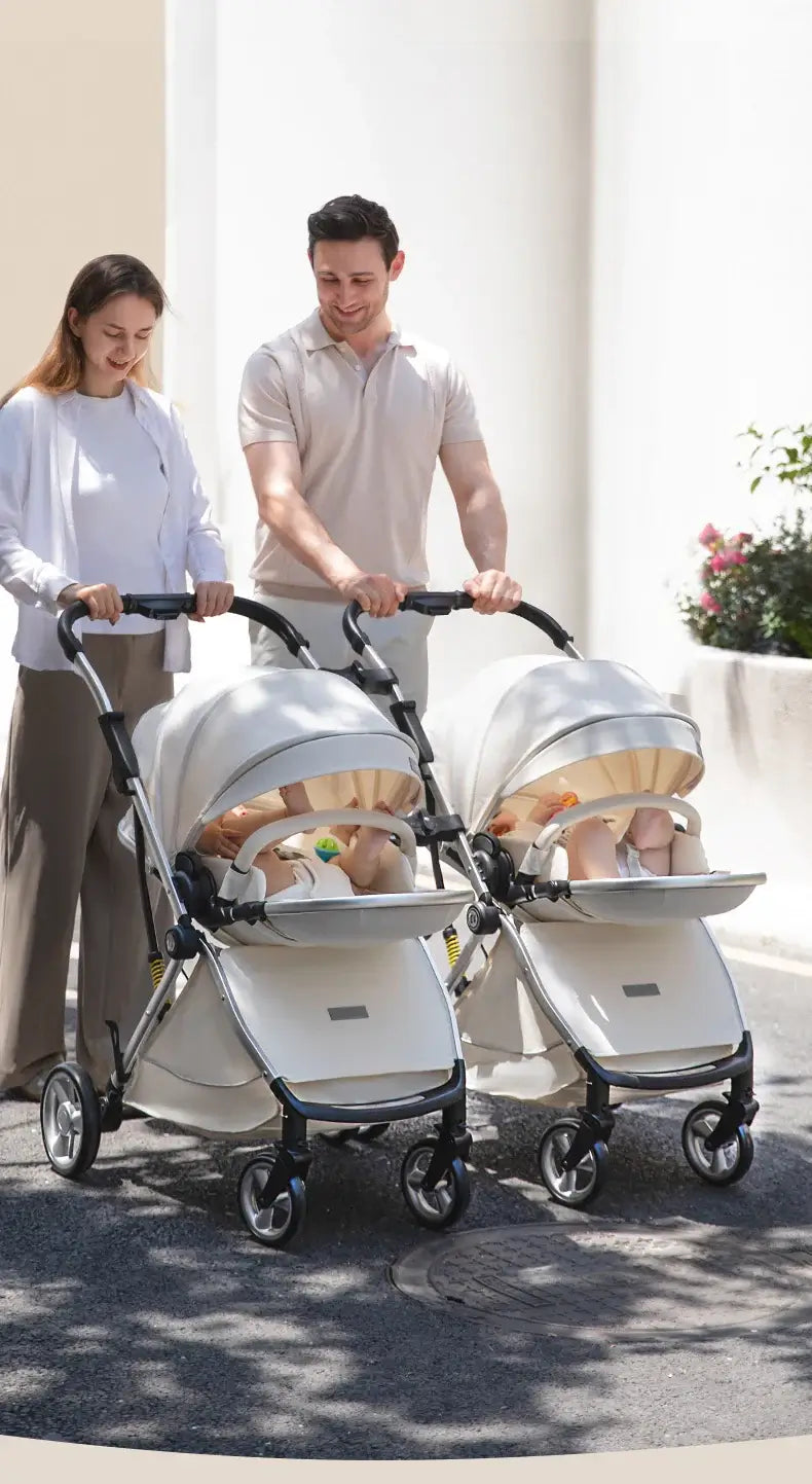 Couple walking with twins in stylish white twin baby stroller, showcasing durability and convenience for parents.